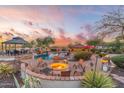 Relaxing backyard oasis with a fire pit and pool at 4090 E Galvin St, Cave Creek, AZ 85331