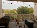 Relaxing patio with seating area, fire pit, and a golf course view at 7800 E Lincoln Dr # 2047, Scottsdale, AZ 85250