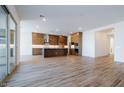 Open living space with tile floors and a view into the kitchen at 1364 E Nolan Pl, Chandler, AZ 85249