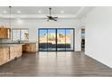 Open floor plan kitchen with sliding doors to backyard at 274 E Mckellips Blvd, Apache Junction, AZ 85119