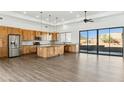 Spacious kitchen with island, stainless steel appliances, and wood cabinets at 274 E Mckellips Blvd, Apache Junction, AZ 85119