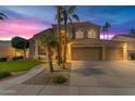 Beautiful two-story home with a three-car garage and landscaped yard at 3180 S Greythorne Way, Chandler, AZ 85248