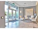 Modern building lobby with comfortable seating area at 1 E Lexington Ave # 701, Phoenix, AZ 85012