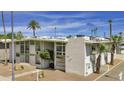 Exterior view of a mid-century modern building with landscaping at 102 W Maryland Ave # B2, Phoenix, AZ 85013