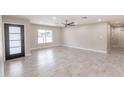 Bright and airy living room with neutral walls and tile flooring at 11252 N 37Th St, Phoenix, AZ 85028