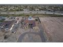 Aerial view of a luxury home with a pool and landscaped backyard at 12331 E Gold Dust Ave, Scottsdale, AZ 85259