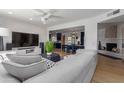 Open concept living space with a view into the dining area and kitchen at 1638 E Hackamore St, Mesa, AZ 85203