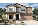 Two-story home with craftsman style, two-car garage, and desert landscaping at 1928 W Rowel Rd, Phoenix, AZ 85085