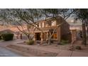 Two-story house with a landscaped front yard and two-car garage at 2602 W Trapanotto Rd, Phoenix, AZ 85086