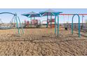 playground with swings and play structures at 37042 W Prado St, Maricopa, AZ 85138