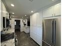 Modern kitchen with stainless steel appliances and granite counters at 416 N Orange --, Mesa, AZ 85201