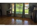 Living room featuring hardwood floors and large windows at 416 N Orange --, Mesa, AZ 85201