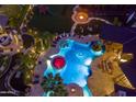 Night view of resort-style pool and backyard oasis at 5040 N Arcadia Dr, Phoenix, AZ 85018