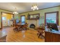 Bright dining room featuring hardwood floors, fireplace and built-ins at 522 W Roosevelt St, Phoenix, AZ 85003