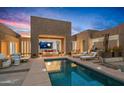 Resort-style pool with patio and lounge seating at 9821 E Sundance Trl, Scottsdale, AZ 85262