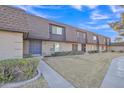 Front view of a townhome with well-maintained landscaping at 1732 E Baker Dr, Tempe, AZ 85282