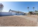 Updated single story home with a gravel front yard at 1801 E Paradise Ln, Phoenix, AZ 85022