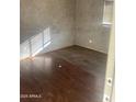 Well lit bedroom with laminate wood flooring at 2029 N 22Nd Pl, Phoenix, AZ 85006