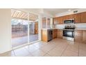 Bright kitchen with sliding door access to a private patio at 4622 W Desert Crest Dr, Glendale, AZ 85301