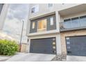 Modern two-story home with attached garage and landscaping at 6850 E Mcdowell Rd # 7, Scottsdale, AZ 85257