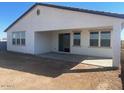 Covered patio with mountain views and large backyard at 18950 W Stella Ave, Waddell, AZ 85355