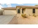 Front view of a house with a garage and driveway at 2298 E Hazeltine Way, Chandler, AZ 85249