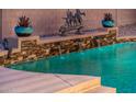 Relaxing pool with water features and statuary at 24018 N 165Th Dr, Surprise, AZ 85387