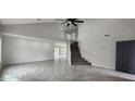 Two-story foyer with gray tile floors, and a staircase at 2463 W Morning Sun Cir, San Tan Valley, AZ 85144