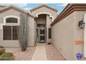 Front entry with security door and pathway at 26616 N 42Nd Way, Cave Creek, AZ 85331