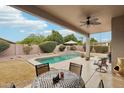 Inviting backyard oasis with a sparkling pool and patio furniture at 26616 N 42Nd Way, Cave Creek, AZ 85331