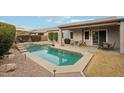 Relaxing pool area with patio and plenty of seating at 26616 N 42Nd Way, Cave Creek, AZ 85331