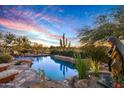 Inviting pool area with a tranquil atmosphere at 39863 N 105Th Pl, Scottsdale, AZ 85262