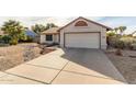 One-story house with a two-car garage and landscaped front yard at 5519 W Elgin St, Chandler, AZ 85226