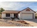 One-story house with a two-car garage and landscaped front yard at 5519 W Elgin St, Chandler, AZ 85226