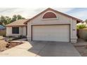 One-story house with a two-car garage and landscaped front yard at 5519 W Elgin St, Chandler, AZ 85226