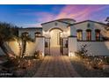 Welcoming entryway with gated access and beautifully landscaped walkway at 6601 E Valley Vista Ln, Paradise Valley, AZ 85253