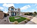 Two-story house with a landscaped yard and a neutral color scheme at 7563 E Plata Ave, Mesa, AZ 85212