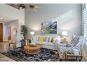 Bright living room with comfortable seating and large artwork at 13600 N Fountain Hills Blvd # 604, Fountain Hills, AZ 85268