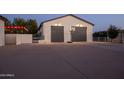 Spacious garage with basketball court and ample parking at 509 E Adamanda Ct, Phoenix, AZ 85086