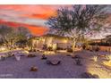 Desert landscaping with lighting features in the front yard of a house at 1075 W Desert Aster Rd, San Tan Valley, AZ 85143