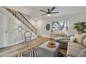 Bright living room with sectional sofa and wood-look floors at 1531 W Colter St # 7, Phoenix, AZ 85015