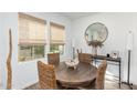 Casual dining area with round table and wicker chairs at 4077 S Sabrina Dr # 24, Chandler, AZ 85248