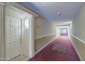 Building hallway with carpet and recessed lighting at 4200 N Miller Rd # 121, Scottsdale, AZ 85251