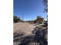 Spacious backyard with gravel and a table and chairs at 140 W 8Th Ave, Mesa, AZ 85210
