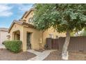 Side yard with pathway, bushes, and a gate at 14595 W Acapulco Ln, Surprise, AZ 85379