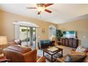 Bright and airy living room with a sliding glass door to backyard at 2725 E Mine Creek Rd # 1121, Phoenix, AZ 85024