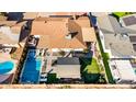 Property features a large backyard, pool, and detached garage at 8213 E Mitchell Dr, Scottsdale, AZ 85251