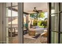 Relaxing outdoor patio accessible from the interior living space at 8213 E Mitchell Dr, Scottsdale, AZ 85251