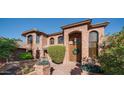 Two-story brick home with a grand entrance at 8280 S Pecan Grove Cir, Tempe, AZ 85284