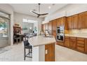 Spacious kitchen featuring an island, double ovens, and ample cabinetry at 14501 N Lark Ct, Fountain Hills, AZ 85268